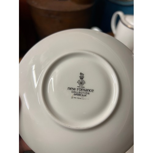 86 - QUANTITY OF ROYAL DOULTON OXFORD BLUE PATTERN DINNERWARE