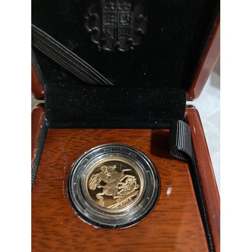 218 - An Elizabeth II Proof Sovereign, bust obverse, reverse George and the Dragon, dated 2018, in plastic... 