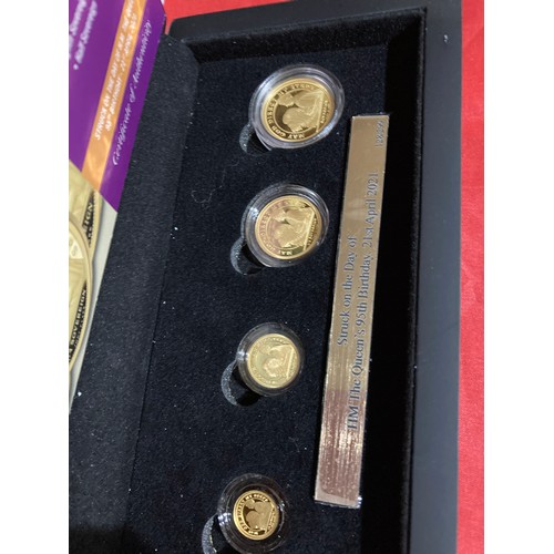 230 - Coins: an Alderney '2021 Queen's 95th Birthday 24 Carat Gold Sovereign Deluxe Set', comprising: sove... 