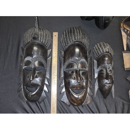 342 - carved african bust plus african masks x 5