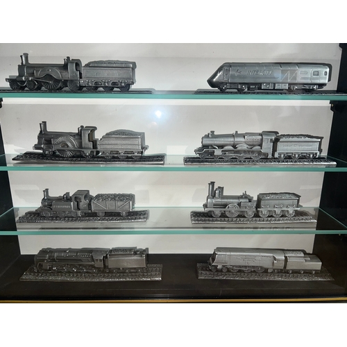 460 - Royal Hampshire pewter trains x 18 in display caninet