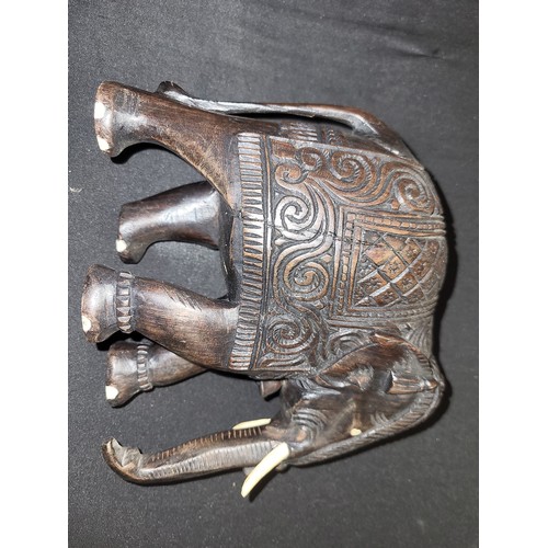 344 - carved wooden elephants x 9