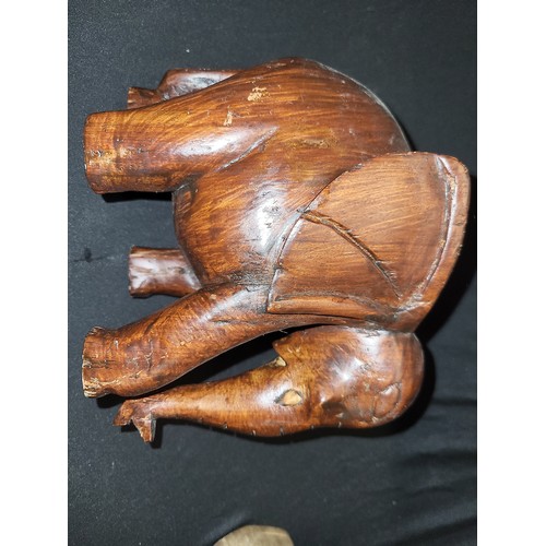 344 - carved wooden elephants x 9