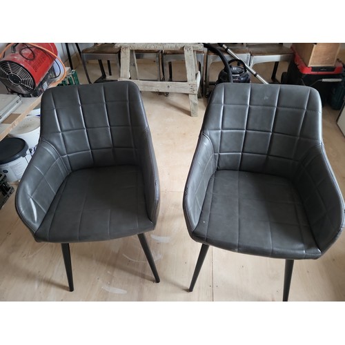 566 - GREY LEATHER DINING CHAIRS X 2 
PLEASE NOTE THIS ITEM IS LOCATED AT THE REUNION BAR, LOFTUS, TS13 4R... 