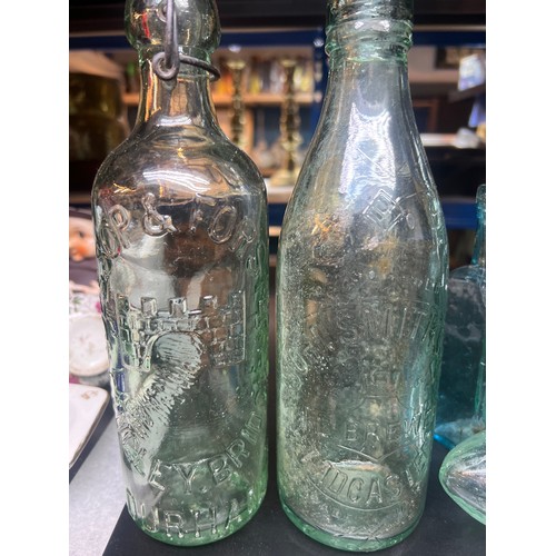 203 - various embossed antique bottles
jessops, john smith etc