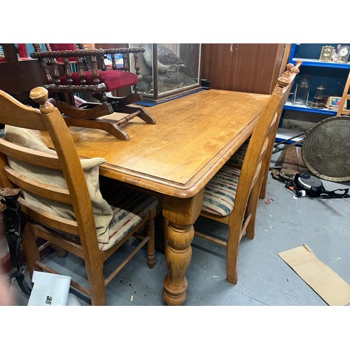 146 - large pine dining table and 4 chairs
75cm high
183cm wide
100cm deep