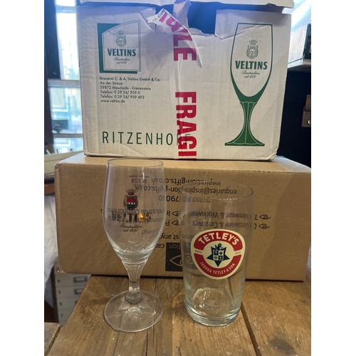 374 - 12 tetley pint glasses and 12 veltins halves