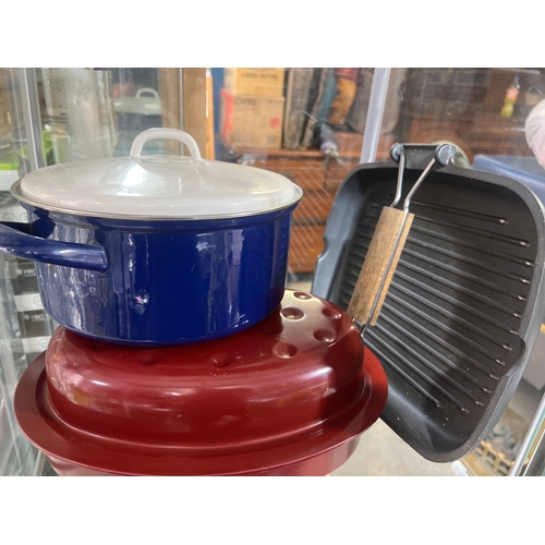 402 - Enamel cookware and a griddle