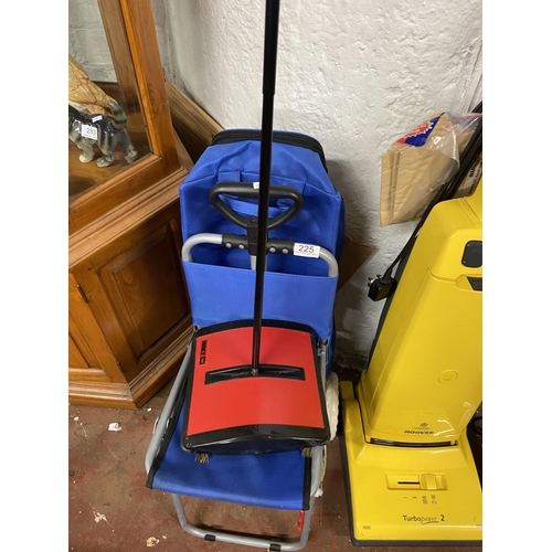 225 - INSULATED BAG WITH SEAT & A CARPET SWEEPER