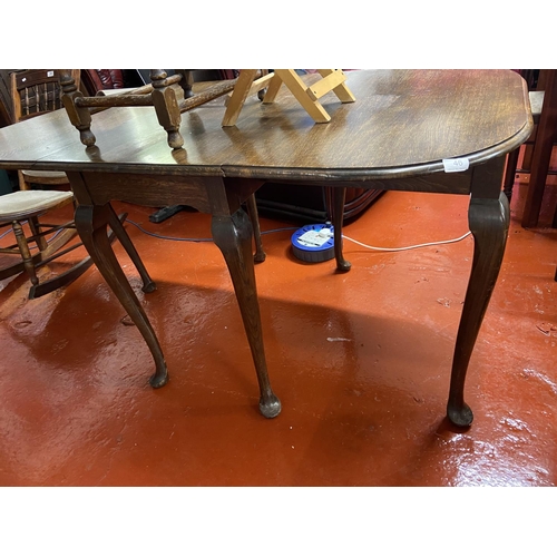 46 - 1920's OAK DROP LEAF DINING TABLE