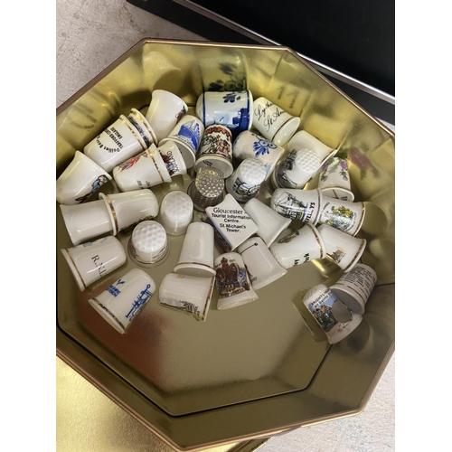 72 - TIN OF CHINA THIMBLES