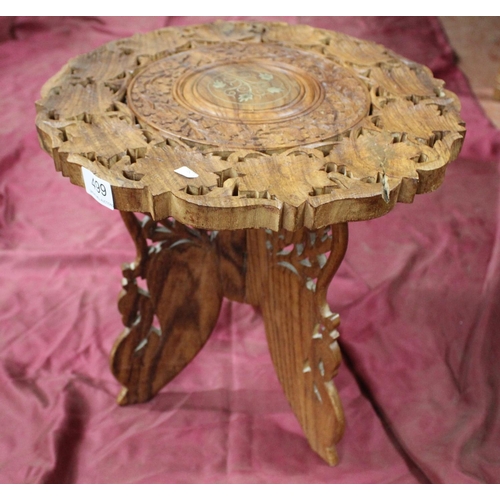 499 - SMALL CARVED INDIAN TABLE