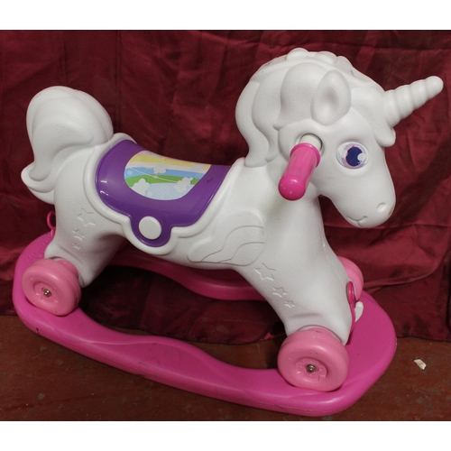 57 - CHILDREN'S RIDE ON UNICORN