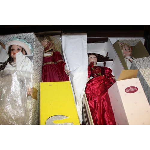 69 - 7 BOXED PORCELAIN COLLECTOR'S DOLLS