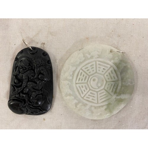 271 - 2 JADE PENDANTS