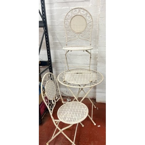 9 - CREAM WROUGHT IRON BISTRO TABLE & 2 FOLDING CHAIRS