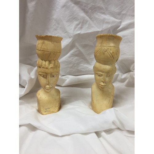 151 - PAIR OF CARVED HORN FIGURES