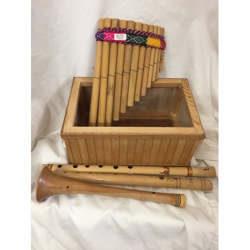 194 - WOODEN BOX & 4 WOOD MUSICAL INSTRUMENTS