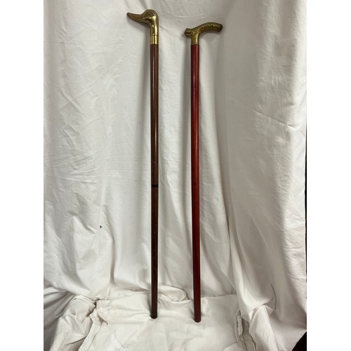 218 - 2 BRASS HEAD WALKING STICKS