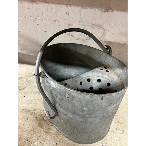 121 - GALVANISED MOP BUCKET