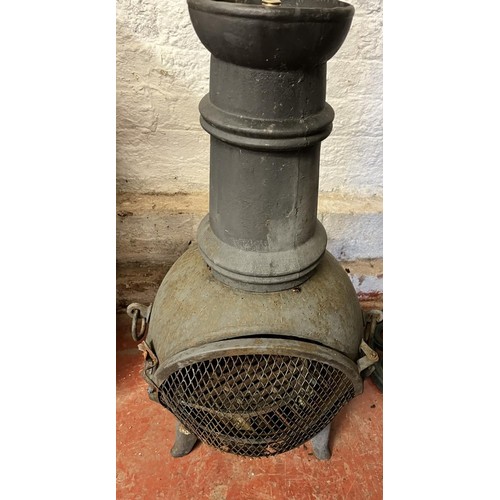 105 - CAST IRON GARDEN CHIMENEA