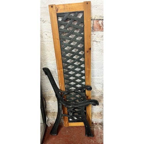 106 - PAIR OF CAST IRON BENCH ENDS & BACK