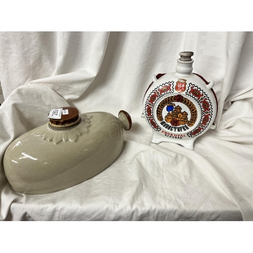 289 - STONE WARE BED WARMER & A CONTINENTAL DECANTER