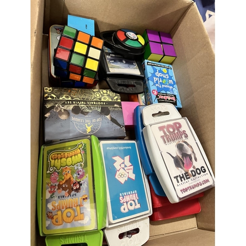 63 - BOX OF TOP TRUMPS & RUBIX CUBES