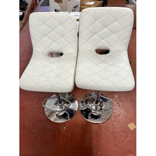 19 - 2 WHITE CUSHIONED RISE & FALL STOOLS (VGC)