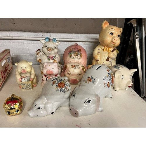 54 - 9 CERAMIC 'PIGGY' MONEY BOXES