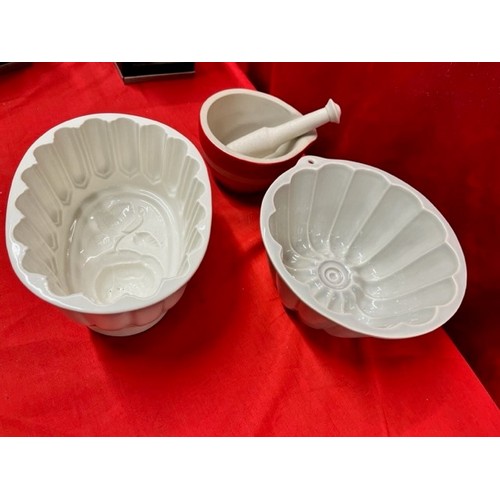 235 - 2 CERAMIC JELLY MOULDS & RED & WHITE STRIPED PESTLE & MORTAR