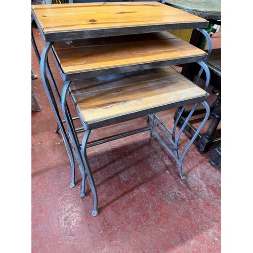 31 - NEST OF 3 CAST IRON LEG WOOD TOP TABLES