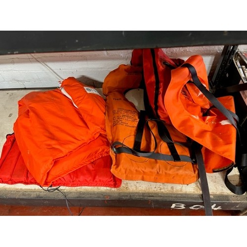 82 - 5 LIFE JACKETS