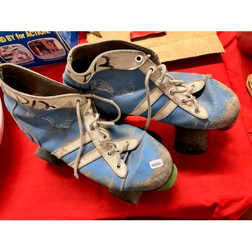 108 - PAIR OF 1980'S ROLLER SKATES