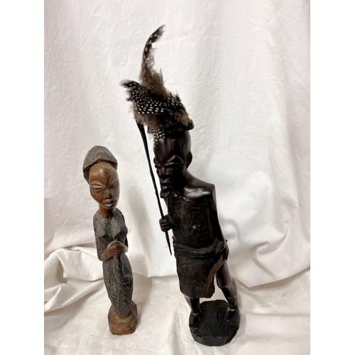 286 - 2 ETHNIC HEAVY CARVED WOOD FIGURES