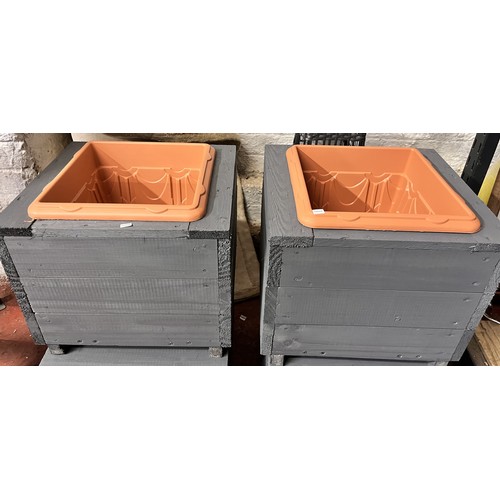 3 - 2 WOODEN PLANTERS WITH INSERTS