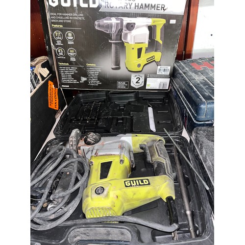 83 - CASED GUILD 1000w SOS ROTARY HAMMER DRILL (W/O)