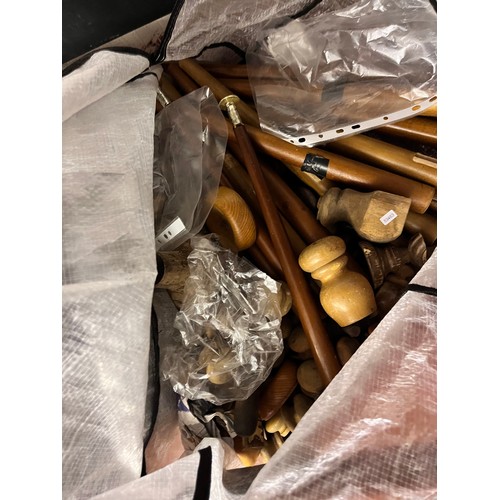 121 - BAG OF WOODEN FURNITURE LEGS & KNOBS