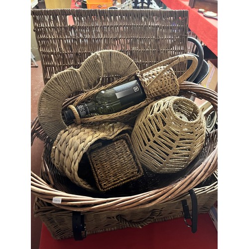 124 - 2 WICKER BASKETS & CONTENTS