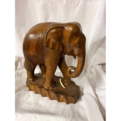 156 - TALL CARVED WOOD ELEPHANT FIGURE