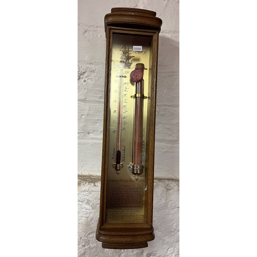 166 - ANTIQUE CASED STORM GLASS BAROMETER