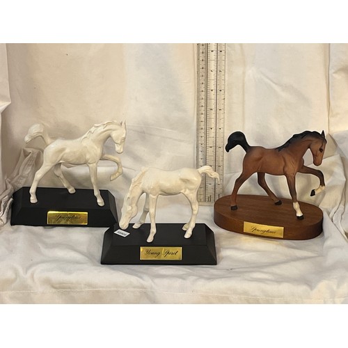 144 - 3 BESWICK FOALS ON PLINTHS