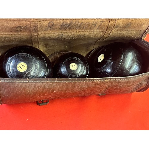 91 - LEATHER CASED BOWLS & JACK