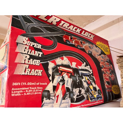 50 - BOXED TCR TRACK LOCK RACING CAR GAME