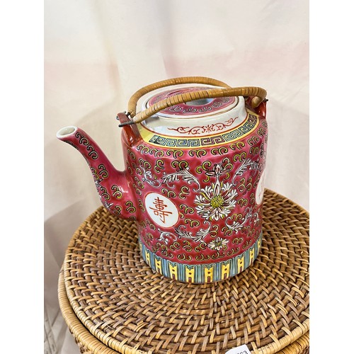 266 - ORIENTAL CHINA TEA POT IN WICKER BASKET