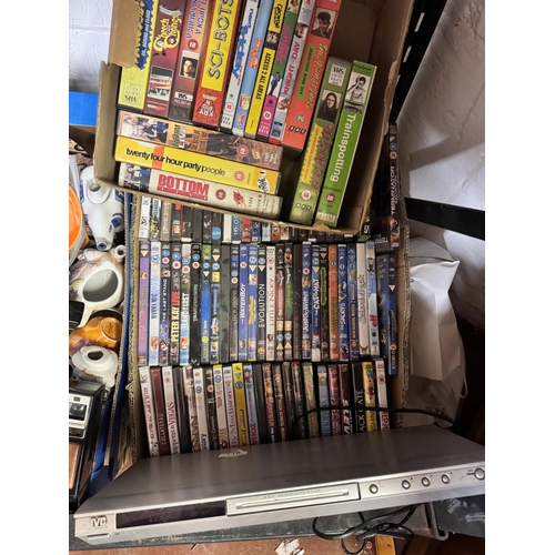 116 - BOX OF DVDS & VHS MOVIES & A DVD PLAYER(A/F)