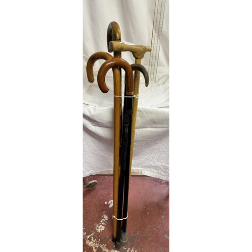 210 - 5 WALKING STICKS