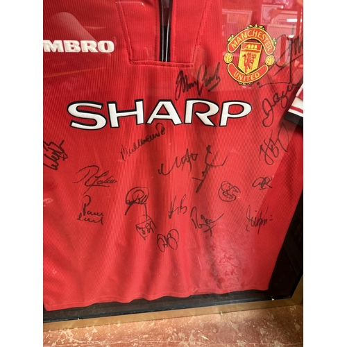 24 - FRAMED MANCHESTER UNITED SIGNED SHIRT