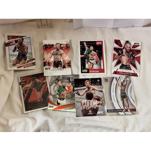 212 - COLLECTION OF C. MCCGREGOR UFC CARDS