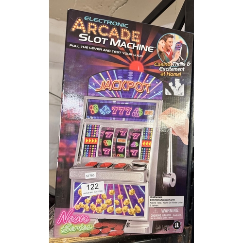 122 - BOXED PENNY ARCADE GAME